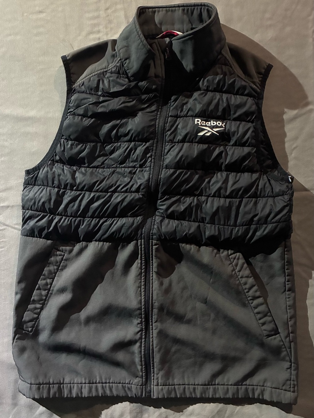 Reebok Black Quilted Vest with Navy Logo Accent